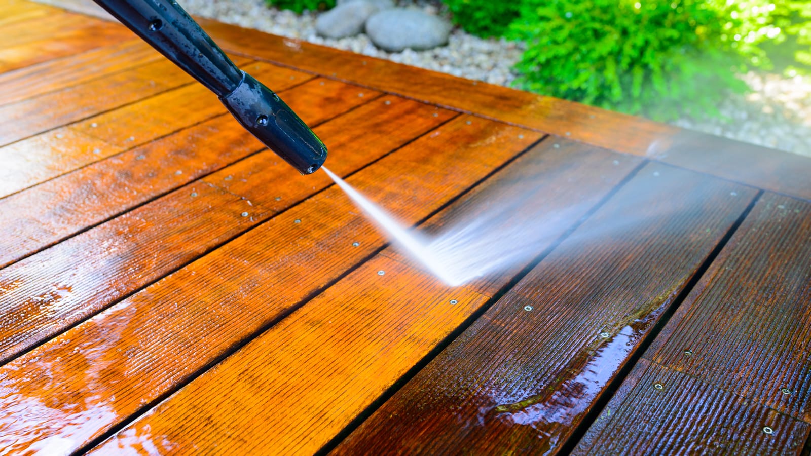 Pressure washing wooden deck